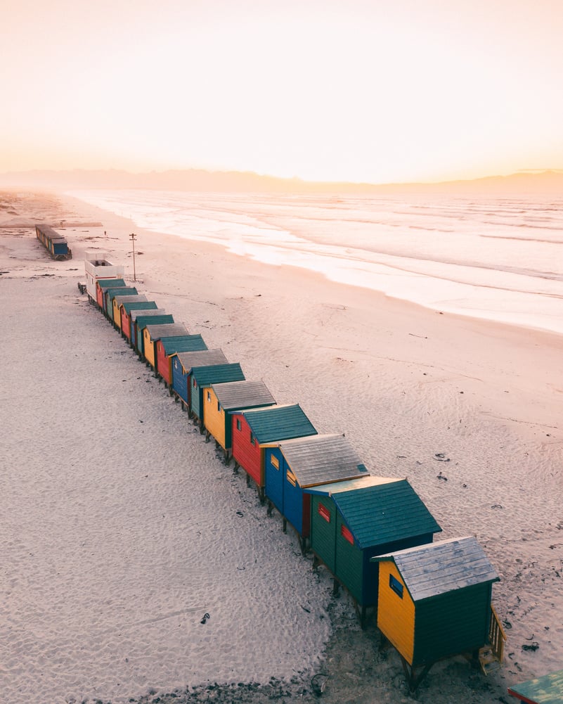 Cozy optimist change rooms on seashore beach in winter